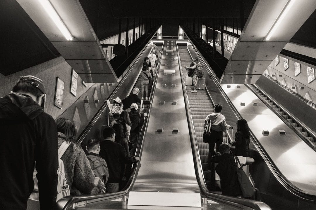The Escalator That Became a Street: How Hong Kong, Chongqing and Yokohama Move People Up a Hillside