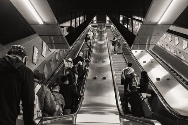 The Escalator That Became a Street: How Hong Kong, Chongqing and Yokohama Move People Up a Hillside